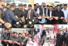 ArchEx Srinagar 2026 exhibition में modern architecture और building material stalls का निरीक्षण करते Satish Sharma