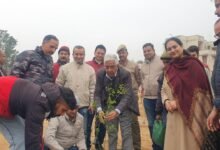 Jammu Municipal Corporation officials and volunteers during Clean Jammu Green Jammu plantation and cleanliness drive in Jammu city.