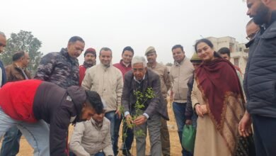 Jammu Municipal Corporation officials and volunteers during Clean Jammu Green Jammu plantation and cleanliness drive in Jammu city.
