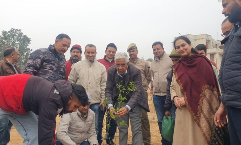 Jammu Municipal Corporation officials and volunteers during Clean Jammu Green Jammu plantation and cleanliness drive in Jammu city.