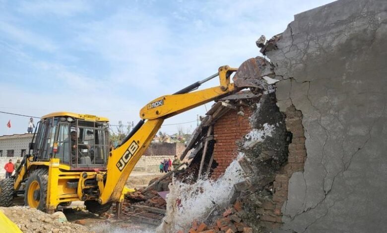 Illegal encroachment on government land in Jammu Kashmir with authorities taking action against land mafia in Rajouri district
