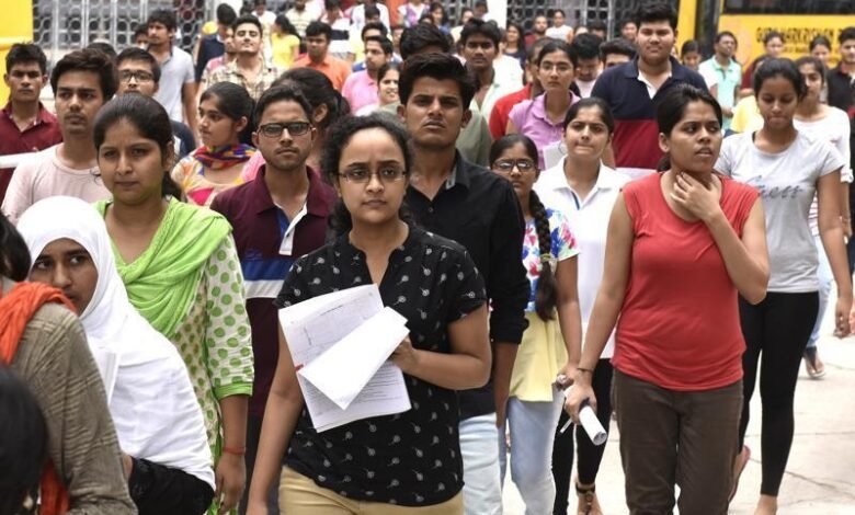 Students outside exam centre after NEET UG 2026 exam cancellation due to paper leak allegations in India