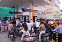 People standing at petrol pump after Petrol Diesel Price Hike in India