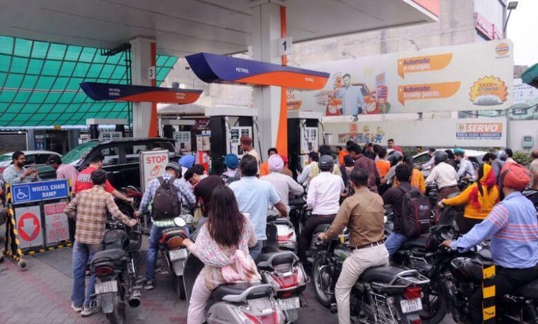 People standing at petrol pump after Petrol Diesel Price Hike in India