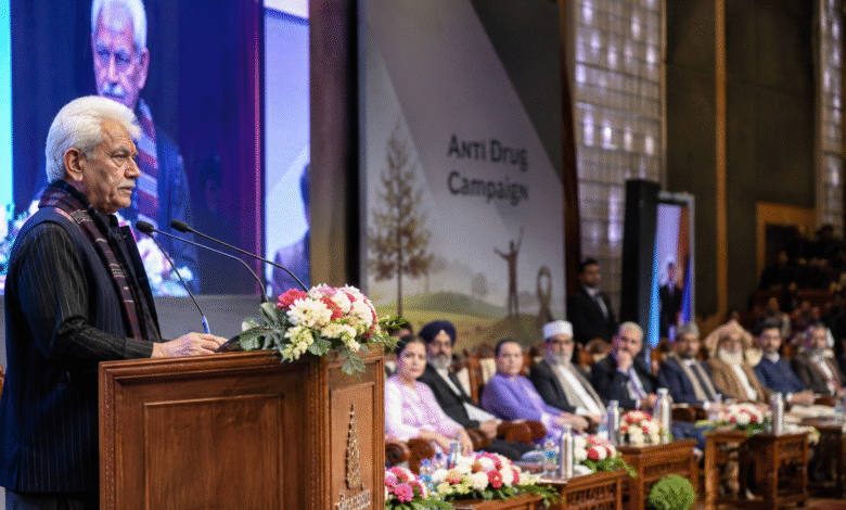 Srinagar SKICC conference hall with LG at podium addressing audience, inter-faith leaders seated, emotional anti-drug campaign awareness event in Jammu and Kashmir, wide landscape news-style photo.