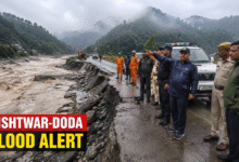 Kishtwar Doda Flood Alert after heavy rainfall in Jammu and Kashmir with emergency response teams inspecting flood-affected roads and damaged infrastructure.