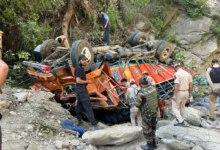NH-44 Truck Accident near Banihal showing overturned truck on Jammu-Srinagar Highway with rescue teams at the scene