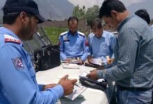 MVD Rajouri traffic enforcement drive में roadside vehicle checking और action।