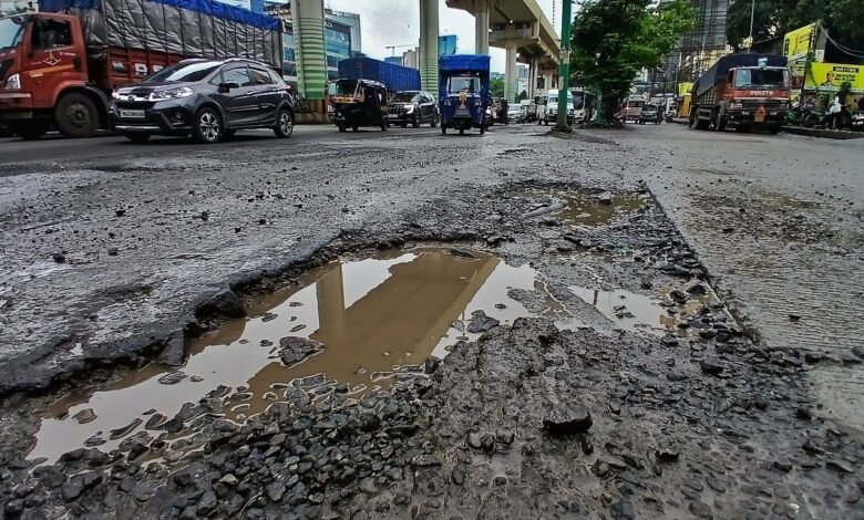 Worsening Toph Sherkhanian Bridge condition with deep potholes and slow moving traffic in Jammu