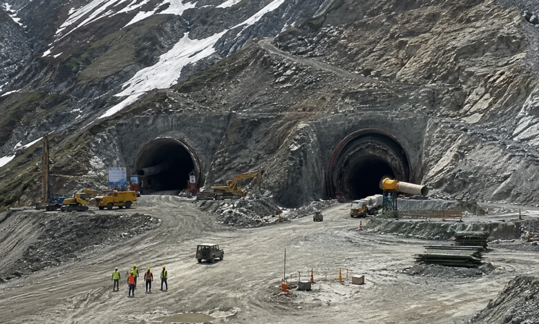 Zojila Tunnel Breakthrough 2026 construction site in Himalayas showing Kashmir–Ladakh all-weather connectivity project with tunnels and machinery