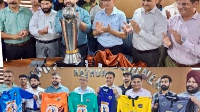 Deputy Commissioner unveiling Kathua Cricket League trophy and team kits