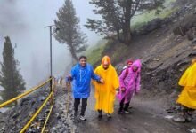 Amarnath Yatra Update showing pilgrims trekking to Holy Cave in rain