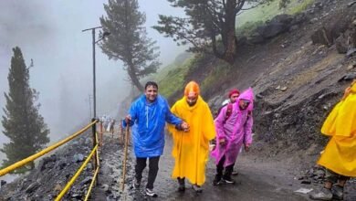Amarnath Yatra Update showing pilgrims trekking to Holy Cave in rain