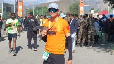 Anuj Mahajan barefoot Kargil Marathon 2026 running tribute to Kargil War heroes in Sarhad Shauryathon